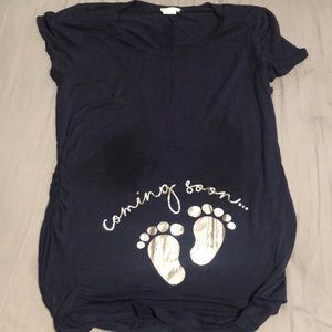 Maternity shirt. “Coming soon “